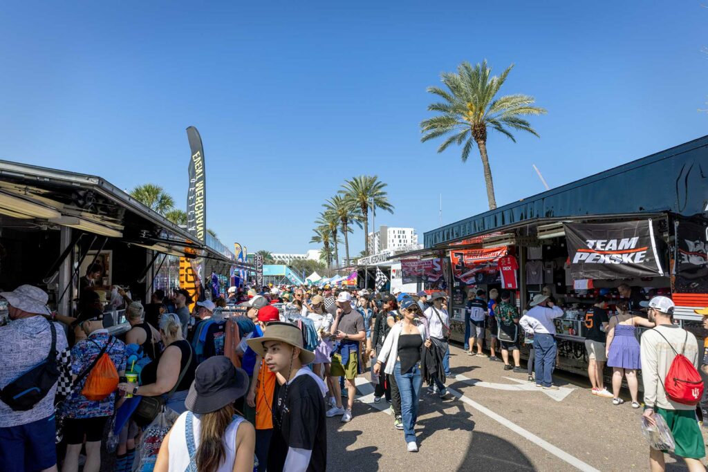 Fans browse team merchandise trailers during the Firestone Grand Prix of St. Petersburg